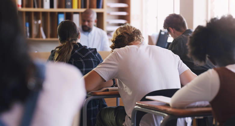 Learning to appreciate the value of hard work. teenagers writing an exam in a classroom (License=RF) ,model released, Symbolfoto  Copyright: xZoonar.com YurixArcursxpeopleimages.comx 19689099 ,model released, Symbolfoto ,property released