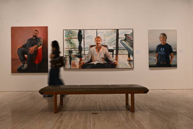 ARCHIBALD PACKING ROOM PRIZE, Patrons look at the finalists of the 2026 Archibald Prize at the Art Gallery of New South Wales in Sydney, Thursday, April 30, 2026. Artist Sean Layh was announced as winner of the Packing Room Prize. ( NO ARCHIVING Sydney New South Wales Australia  Copyright: xDEANxLEWINSx 20260430167427013385