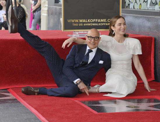 Actors Stanley Tucci (L) and Emily Blunt sit next to her star during a double unveiling ceremony honoring Blunt and Tucci with the 2,841st and 2,842nd star respectively on the Hollywood Walk of Fame in Los Angeles on Thursday, April 30, 2026.  LAP2026043001 JIMxRUYMEN