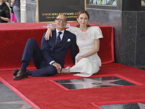 Actors Stanley Tucci (L) and Emily Blunt sit next to her star during a double unveiling ceremony honoring Blunt and Tucci with the 2,841st and 2,842nd star respectively on the Hollywood Walk of Fame in Los Angeles on Thursday, April 30, 2026.  LAP2026043003 JIMxRUYMEN