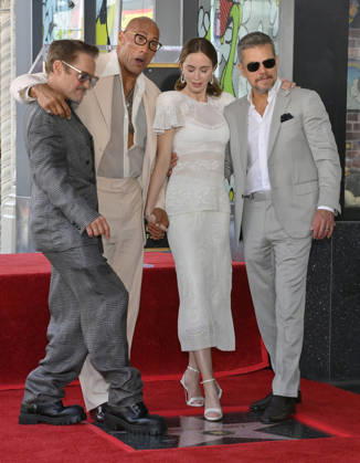 Robert Downey Jr., Dwayne Johnson, Emily Blunt and Matt Damon (L-R) attend a double unveiling ceremony honoring Blunt and Stanley Tucci with the 2,841st and 2,842nd star respectively on the Hollywood Walk of Fame in Los Angeles on Thursday, April 30, 2026.  LAP20260430312 JIMxRUYMEN
