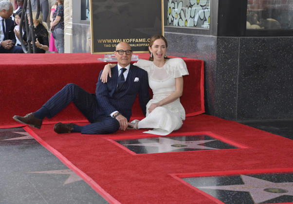 Actors Stanley Tucci (L) and Emily Blunt sit next to her star during a double unveiling ceremony honoring Blunt and Tucci with the 2,841st and 2,842nd star respectively on the Hollywood Walk of Fame in Los Angeles on Thursday, April 30, 2026.  LAP2026043002 JIMxRUYMEN