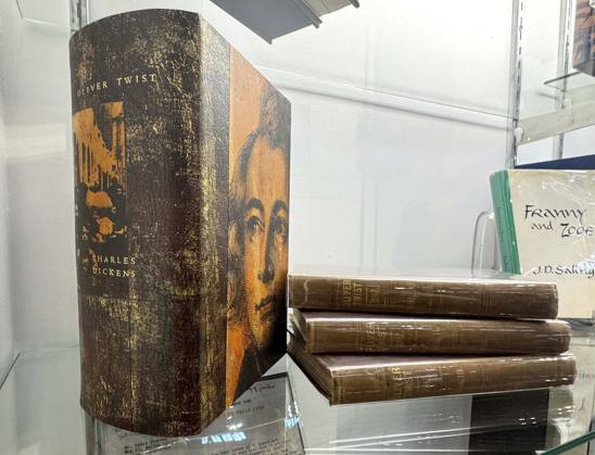 April 30, 2026, New York, New York, USA: Signed three volume set of Oliver Twist by Charles Dickens, first edition, 1841 offered for $150,000, seen at the press preview for the ABAA New York International Antiquarian Book Fair held at the Park Avenue Armory. New York USA  - ZUMAk03_ 20260430_zaf_k03_039 Copyright: xNancyxKaszermanx