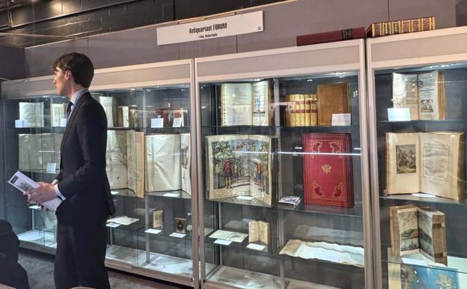 April 30, 2026, New York, New York, USA: Bookseller from Antiquariaat FORUM (Forum Rare Books) from Netherlands seen at the press preview for the ABAA New York International Antiquarian Book Fair held at the Park Avenue Armory. New York USA  - ZUMAk03_ 20260430_zaf_k03_040 Copyright: xNancyxKaszermanx