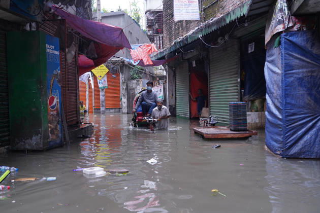 May 1, 2026, Dhaka, Dhaka, Bangladesh: DHAKA, BANGLADESH †May 1, 2026: After several hours of continuous rainfall, many small and major roads across the capital Dhaka were submerged, with water levels ranging from knee-deep to waist-deep in some areas. People forced to leave their homes for work faced severe difficulties, disrupting normal city life. Stray dogs and other animals were also left vulnerable in the flooded conditions. In many cases, clogged manholes filled with plastic waste and debris obstructed drainage systems, leading to widespread waterlogging. Dhaka Bangladesh - ZUMAk185 20260501_zip_k185_015 Copyright: xRubelxKarmakerx