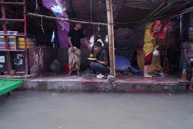 May 1, 2026, Dhaka, Dhaka, Bangladesh: DHAKA, BANGLADESH †May 1, 2026: After several hours of continuous rainfall, many small and major roads across the capital Dhaka were submerged, with water levels ranging from knee-deep to waist-deep in some areas. People forced to leave their homes for work faced severe difficulties, disrupting normal city life. Stray dogs and other animals were also left vulnerable in the flooded conditions. In many cases, clogged manholes filled with plastic waste and debris obstructed drainage systems, leading to widespread waterlogging. Dhaka Bangladesh - ZUMAk185 20260501_zip_k185_016 Copyright: xRubelxKarmakerx