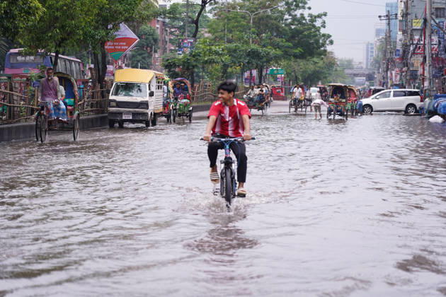 May 1, 2026, Dhaka, Dhaka, Bangladesh: DHAKA, BANGLADESH †May 1, 2026: After several hours of continuous rainfall, many small and major roads across the capital Dhaka were submerged, with water levels ranging from knee-deep to waist-deep in some areas. People forced to leave their homes for work faced severe difficulties, disrupting normal city life. Stray dogs and other animals were also left vulnerable in the flooded conditions. In many cases, clogged manholes filled with plastic waste and debris obstructed drainage systems, leading to widespread waterlogging. Dhaka Bangladesh - ZUMAk185 20260501_zip_k185_048 Copyright: xRubelxKarmakerx