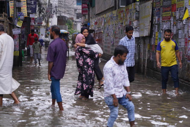 May 1, 2026, Dhaka, Dhaka, Bangladesh: DHAKA, BANGLADESH †May 1, 2026: After several hours of continuous rainfall, many small and major roads across the capital Dhaka were submerged, with water levels ranging from knee-deep to waist-deep in some areas. People forced to leave their homes for work faced severe difficulties, disrupting normal city life. Stray dogs and other animals were also left vulnerable in the flooded conditions. In many cases, clogged manholes filled with plastic waste and debris obstructed drainage systems, leading to widespread waterlogging. Dhaka Bangladesh - ZUMAk185 20260501_zip_k185_044 Copyright: xRubelxKarmakerx