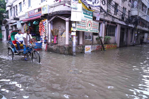 May 1, 2026, Dhaka, Dhaka, Bangladesh: DHAKA, BANGLADESH †May 1, 2026: After several hours of continuous rainfall, many small and major roads across the capital Dhaka were submerged, with water levels ranging from knee-deep to waist-deep in some areas. People forced to leave their homes for work faced severe difficulties, disrupting normal city life. Stray dogs and other animals were also left vulnerable in the flooded conditions. In many cases, clogged manholes filled with plastic waste and debris obstructed drainage systems, leading to widespread waterlogging. Dhaka Bangladesh - ZUMAk185 20260501_zip_k185_042 Copyright: xRubelxKarmakerx