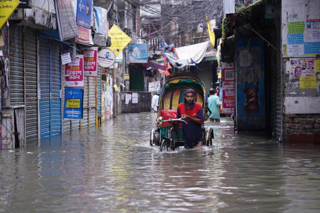 May 1, 2026, Dhaka, Dhaka, Bangladesh: DHAKA, BANGLADESH †May 1, 2026: After several hours of continuous rainfall, many small and major roads across the capital Dhaka were submerged, with water levels ranging from knee-deep to waist-deep in some areas. People forced to leave their homes for work faced severe difficulties, disrupting normal city life. Stray dogs and other animals were also left vulnerable in the flooded conditions. In many cases, clogged manholes filled with plastic waste and debris obstructed drainage systems, leading to widespread waterlogging. Dhaka Bangladesh - ZUMAk185 20260501_zip_k185_002 Copyright: xRubelxKarmakerx