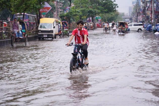 May 1, 2026, Dhaka, Dhaka, Bangladesh: DHAKA, BANGLADESH †May 1, 2026: After several hours of continuous rainfall, many small and major roads across the capital Dhaka were submerged, with water levels ranging from knee-deep to waist-deep in some areas. People forced to leave their homes for work faced severe difficulties, disrupting normal city life. Stray dogs and other animals were also left vulnerable in the flooded conditions. In many cases, clogged manholes filled with plastic waste and debris obstructed drainage systems, leading to widespread waterlogging. Dhaka Bangladesh - ZUMAk185 20260501_zip_k185_040 Copyright: xRubelxKarmakerx