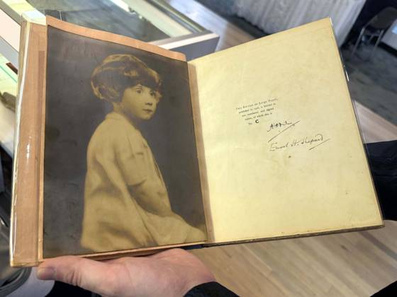 April 30, 2026, New York, New York, USA: Portrait of Christopher Robin Milne, son of the author, seen on the inside cover of Winnie the Pooh,1926 edition limited to 200 copies, signed by author A.A. Milne and illustrator E. H. Shepard, offered by Black Swan Books for $19,500,00 seen at the press preview for the ABAA New York International Antiquarian Book Fair held at the Park Avenue Armory. New York USA - ZUMAk03_ 20260430_zaf_k03_021 Copyright: xNancyxKaszermanx