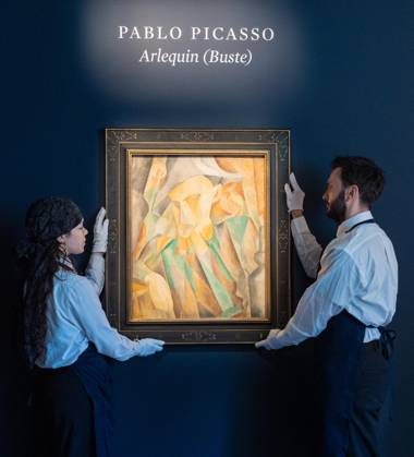 May 1, 2026, Bronx, New York, USA: Auction assistants pose with Pablo Picasso Arlequin during May Marquee Modern & Contemporary Auctions press preview at Sotheby s The Breuer in New York, NY on May 1, 2026. Bronx USA  - ZUMAr339 20260501_znp_r339_037 Copyright: xLevxRadinx