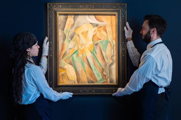 May 1, 2026, Bronx, New York, USA: Auction assistants pose with Pablo Picasso Arlequin during May Marquee Modern & Contemporary Auctions press preview at Sotheby s The Breuer in New York, NY on May 1, 2026. Bronx USA  - ZUMAr339 20260501_znp_r339_038 Copyright: xLevxRadinx
