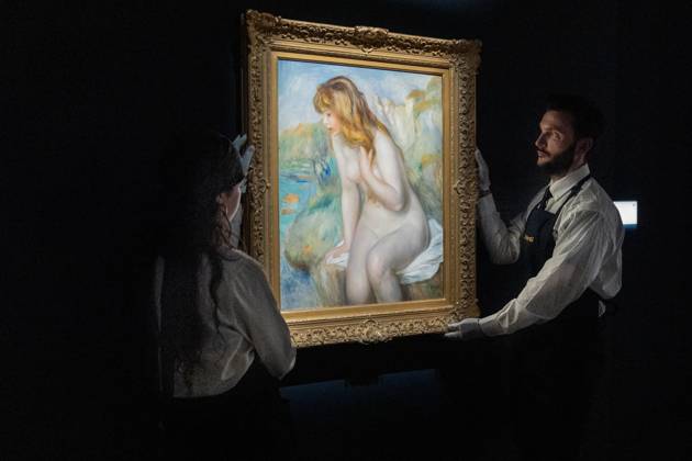May 1, 2026, Bronx, New York, USA: Auction assistants pose with Pierre-Auguste Renoir Baigneuse assise sur un rocher during May Marquee Modern & Contemporary Auctions press preview at Sotheby s The Breuer in New York, NY on May 1, 2026. Bronx USA  - ZUMAr339 20260501_znp_r339_029 Copyright: xLevxRadinx