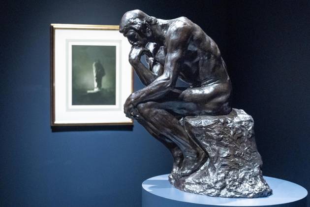 May 1, 2026, Bronx, New York, USA: Bronze sculpture Penseur, Taille De La Porte Dit Moyen Modele by Auguste Rodin with photograph Balzac by Edward Steichen on the background on view during May Marquee Modern & Contemporary Auctions press preview at Sotheby s The Breuer in New York, NY on May 1, 2026. Bronx USA  - ZUMAr339 20260501_znp_r339_025 Copyright: xLevxRadinx