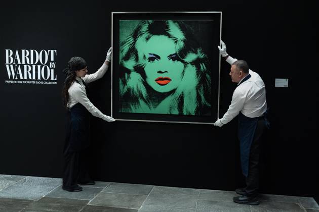 May 1, 2026, Bronx, New York, USA: Auction assistants pose with Andy Warhol Brigitte Bardot during May Marquee Modern & Contemporary Auctions press preview at Sotheby s The Breuer in New York, NY on May 1, 2026. Bronx USA  - ZUMAr339 20260501_znp_r339_020 Copyright: xLevxRadinx