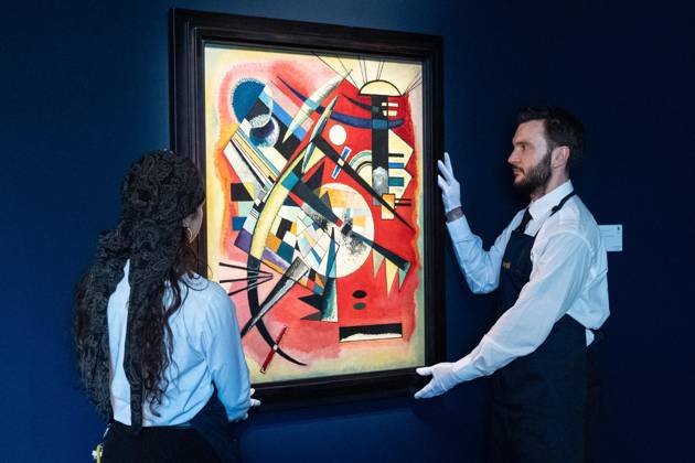 May 1, 2026, Bronx, New York, USA: Auction assistants pose with Wassily Kandinsky Rote Tiefe (Red Depth) during May Marquee Modern & Contemporary Auctions press preview at Sotheby s The Breuer in New York, NY on May 1, 2026. Bronx USA - ZUMAr339 20260501_znp_r339_042 Copyright: xLevxRadinx