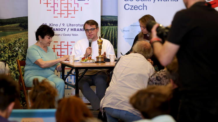 Russian co-director and lead actor Pavel Pasha Talankin speaks and poses with Oscar statuette for his film Mr. Nobody Against Putin, which was lost on his flight back from the United States to Germany. Pavel Talankin is guest at the Cinema on the Border film festival in Tesin, Poland, May 3, 2026. (CTKxPhoto PetrxSznapka) CTKPhotoP2026050303171  CTKPhotoP2026050303171