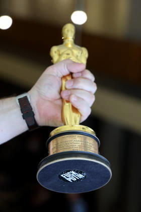 Russian co-director and lead actor Pavel Pasha Talankin (not pictured) presents Oscar statuette for his film Mr. Nobody Against Putin, which was lost on his flight back from the United States to Germany. Pavel Talankin is guest at the Cinema on the Border film festival in Tesin, Poland, May 3, 2026. (CTKxPhoto PetrxSznapka) CTKPhotoP2026050303404  CTKPhotoP2026050303404