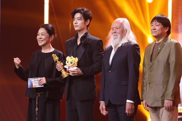 BEIJING, CHINA - MAY 03: (L-R) Actress TV host Ni Ping, actor Xiao Zhan, actor Wang Deshun and director Huo Jianqi attend the award ceremony of the 33rd College Student Film Festival on May 3, 2026 in Beijing, China.  Copyright: xVCGx 111638930932