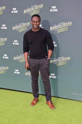 Jerry Kwarteng beim Star Wars: The Mandalorian and Grogu Photocall im Rahmen der Film Premiere & Fan Event am Uber Platz in der Uber Eats Music Hall am 4.05.2026 in Berlin Jerry Kwarteng at the Star Wars: The Mandalorian and Grogu photocall during the film premiere & fan event at Uber Platz in the Uber Eats Music Hall on May 4, 2026 in Berlin Star Wars: The Mandalorian and Grogu Filmpremiere & Fan Event in Berlin