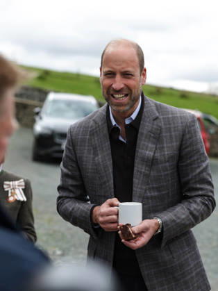 The Prince of Wales Visits North Yorkshire 05 05 2026. Swaledale, UK. The Prince of Wales during a visit with farmers from across Swaledale at a local family farm. His Royal Highness joined a conversation with a group of young farmers, all of whom have young families. Before touring some of the land, The Prince met the partners and children of the farmers, hearing first‘hand about their experiences of living and growing up within farming families, and how family life, work and the landscape are closely intertwined in rural communities., Credit:Pete Maclaine Avalon United Kingdom, England, Swaledale  Copyright: xPetexMaclainex xAvalonx 1096763882