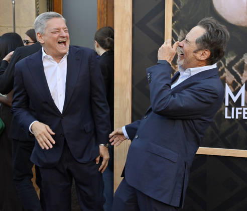 Ted Sarandos (L) and Dennis Miller attend the premiere of Netflix s documentary Marty Life Is Short at the Egyptian Theatre in the Hollywood section of Los Angeles on Wednesday, May 6, 2026. Storyline: The definitive documentary on comedian Martin Short, exploring his career across film, television, theater and comedy.  LAP2026050609 JIMxRUYMEN