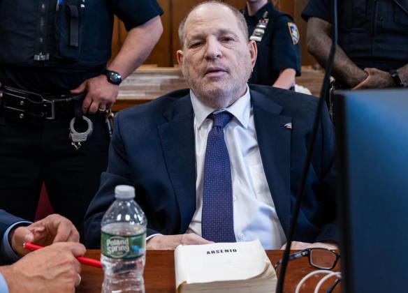 Former Hollywood film producer Harvey Weinstein appears in Manhattan criminal court for the retrial of his rape case on Thursday, May 7, 2026, in New York City. Weinstein, the disgraced former Hollywood producer, will be tried for a third time by New York prosecutors in the sexual assault case of Jessica Mann. The memoir Arsenio sits on the table in front of Weinstein. Pool  NYX20260507202 SpencerxPlatt