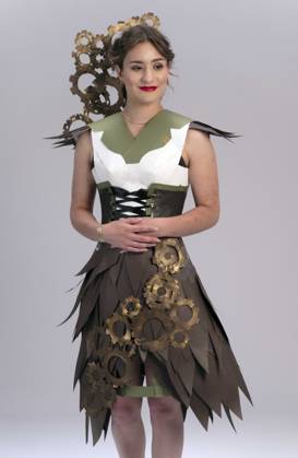 May 07,, 2026 - Denver, Colorado, USA - A model strikes a pose at the 20th Annual Denver Paper Fashion Show. Using only paper to create haute couture, fashion designers created dozens of wearable art designs for this year s show themed Folded in Time. Produced by the One Club for Creativity Denver, the runway show is a fundraiser for Downtown Aurora Visual Arts, which provides after-school arts programs for local youth. Denver USA  - ZUMAce6_ 20260507_zaf_ce6_007 Copyright: xBrianxCahnx