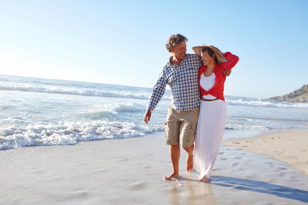 Living, loving and laughing. a mature couple enjoying a late afternoon walk on the beach (License=RF) ,model released, Symbolfoto  Copyright: xZoonar.com KasperxRavlox 20136889 ,model released, Symbolfoto ,property released