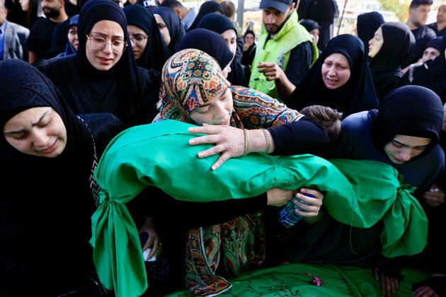(260511) -- HARET SAIDA, May 11, 2026 -- People mourn at a funeral for people killed in Israeli airstrikes in Haret Saida, south Lebanon, May 10, 2026. At least 15 people were killed in a series of Israeli airstrikes in southern Lebanon on Saturday, according to Lebanese official sources. At least one child was among those killed and several children were among those injured in the strikes, according to the Lebanese Health Ministry and the National News Agency. (Photo by Xinhua) LEBANON-HARET SAIDA-ISRAELI AIRSTRIKE-FUNERAL AlixHashisho 