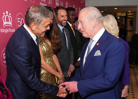 King Charles and Queen Camilla attend A King s Trust Celebration King Charles meets George and Amal Clooney as he attends A King s Trust Celebration to mark the 50th anniversary of the charity. The King s Trust, formerly known as The Prince s Trust, helps those from disadvantaged communities, at the Royal Albert Hall, London, UK, on the 11th May 2026. Picture by Aaron Chown WPA-Pool London Royal Albert Hall London United Kingdom  WHA-0817