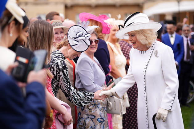 Royal Garden Party at Buckingham Palace Queen Camilla (right) greets guests during a Royal Garden Party at Buckingham Palace, London, to celebrate frontline workers from across the United Kingdom and recognise the dedication and contribution of those who serve their communities through volunteering, supporting charitable causes and working for emergency services. Picture date: Tuesday May 12, 2026., Credit:Aaron Chown PA ROTA - B68 Avalon UK, London  Copyright: xAaronxChownx xPAxROTAx-xB68x xAvalonx 1098334901
