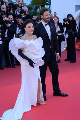 Electric Kiss Premiere at 79th Festival de Cannes - Cannes, France CANNES, FRANCE. May 12, 2026: Joan Collins & Laurent Lafitte at the Grand Opening and premiere for The Electric Kiss at the 79th Festival de Cannes. Picture: Paul Smith Featureflash Cannes France  Copyright: xPaulxSmithx xFeatureflashx