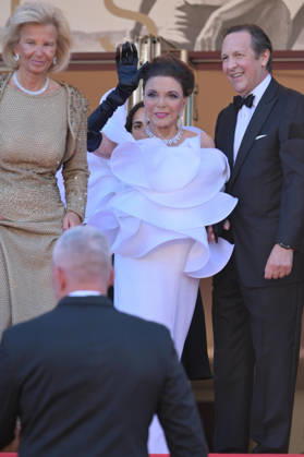 Electric Kiss Premiere at 79th Festival de Cannes - Cannes, France CANNES, FRANCE. May 12, 2026: Joan Collins & Percy Gibson at the Grand Opening and premiere for The Electric Kiss at the 79th Festival de Cannes. CAP GOL GOL Cannes Provence-Alpes-Côte d Azur France Copyright: xRickxGold CapitalxPicturesx
