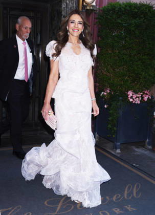 Elizabeth Hurley and her son Damien Hurley leave their hotel to attend the Breast Cancer Research Foundation Hot Pink Party Featuring: Elizabeth Hurley Where: New York, United States When: 12 May 2026 Credit: Darla Khazei INSTARimages EDITORIAL USE ONLY. NOT FOR USE BY NEWSPAPERS BASED IN THE UK. Copyright: xx instar55685249