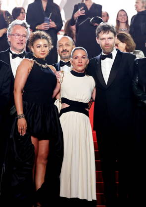 François Kraus, Emma Boumali, Mickaëlle Paty sister of Samuel Paty , Antoine Reinartz Descente des marches du film Labandon lors du 79ème Festival International du Film de Cannes, le 13 mai 2026 Jacovides Moreau Bestimage People leaving the red carpet for Forsaken at the 79th Cannes International Film Festival on May 13, 2026 Cannes France  Copyright: xJACOVIDES-MOREAUx xBESTIMAGExJACOVIDES-MOREAUx xBESTIMAGEx
