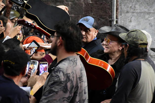 May 13, 2026, Mexico City, Ciudad de Mexico, Mexico: Bono lead of the Irish band U2, signs autographs for the fans at the filming set for the upcoming music video Street of Dreams in Mexico City Downtown. on May 13, 2026 in Mexico City, Mexico. Mexico City Mexico - ZUMAe321 20260513_zea_e321_034 Copyright: xLuisxBarronx