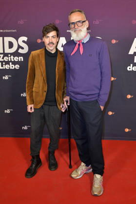 Aron Boks mit Gast bei der Preview der ZDF-Dokuserie AIDS - In Zeiten der Liebe im Kino International. Berlin, 13.05.2026