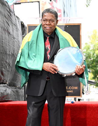 Brazilian Percusionist Paulinho Da Costa Honored With A Star On The Hollywood Walk Of Fame in California, USA - 13 MAY 2026. Musician, Paulinho Da Costa seen posing on a Star during The Hollywood Walk Of Fame in Hollywood. California United States Copyright: xAlbertxL.xOrtegax xSOPAxImagesx DSC_3283