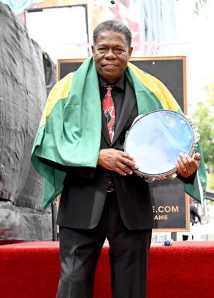 Brazilian Percusionist Paulinho Da Costa Honored With A Star On The Hollywood Walk Of Fame in California, USA - 13 MAY 2026. Musician, Paulinho Da Costa seen posing on a Star during The Hollywood Walk Of Fame in Hollywood. California United States Copyright: xAlbertxL.xOrtegax xSOPAxImagesx DSC_3294