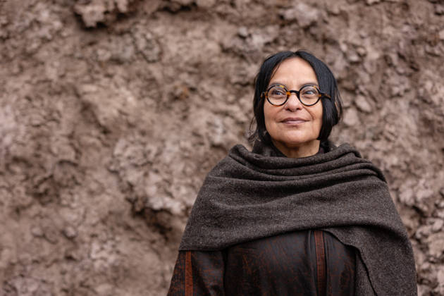 Delcy Morelos: origo at the Barbican Sculpture Court, London, UK 14 May 2026 Colombian artist Delcy Morelos poses with her sculpture origo at the Barbican Sculpture Court, London, UK, on 14 May 2026. The giant earthen sculpture spans roughly 24 x 18 metres and is hand-built with several tonnes of soil and aromatic spices including cinnamon and coffee, initially inspired by the architecture of the Yanomami people of the Amazon, on view from 15 May until 31 July 2026., Credit:Pete Speller Avalon  Copyright: xPetexSpellerx xAvalonx 1098916716