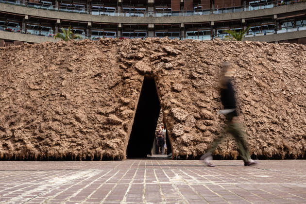 Delcy Morelos: origo at the Barbican Sculpture Court, London, UK 14 May 2026 origo, a monumental earthen sculpture by Colombian artist Delcy Morelos, on display at the Barbican Sculpture Court, London, UK, on 14 May 2026. The work spans roughly 24 x 18 metres and is hand-built with several tonnes of soil and aromatic spices including cinnamon and coffee, marking the first large-scale artistic commission in the Sculpture Court in ten years, on view from 15 May until 31 July 2026., Credit:Pete Speller Avalon Copyright: xPetexSpellerx xAvalonx 1098916800