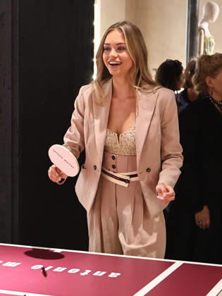 IPA84680175 - Rome, Laila Hasanovic attends the Antonio Marras boutique event. Pictured: Laila Hasanovic plays ping pong. Copyright: xMarcoxProvvisionatox xMarcoxProvvisionatox 84680175