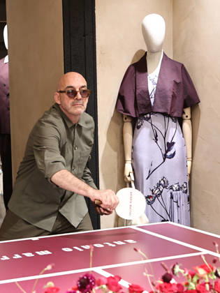 IPA84680223 - Rome, Laila Hasanovic attends the Antonio Marras boutique event. Pictured: Antonio Marras plays ping pong. Copyright: xMarcoxProvvisionatox xMarcoxProvvisionatox 84680223