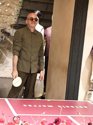 IPA84680216 - Rome, Laila Hasanovic attends the Antonio Marras boutique event. Pictured: Antonio Marras plays ping pong. Copyright: xMarcoxProvvisionatox xMarcoxProvvisionatox 84680216