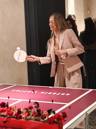 IPA84680191 - Rome, Laila Hasanovic attends the Antonio Marras boutique event. Pictured: Laila Hasanovic plays ping pong.  Copyright: xMarcoxProvvisionatox xMarcoxProvvisionatox 84680191