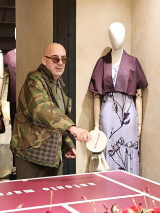 IPA84680204 - Rome, Laila Hasanovic attends the Antonio Marras boutique event. Pictured: Antonio Marras plays ping pong.  Copyright: xMarcoxProvvisionatox xMarcoxProvvisionatox 84680204