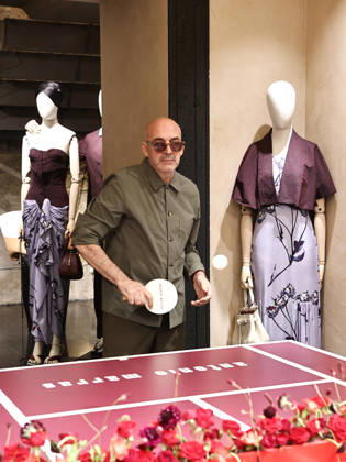 IPA84680212 - Rome, Laila Hasanovic attends the Antonio Marras boutique event. Pictured: Antonio Marras plays ping pong.  Copyright: xMarcoxProvvisionatox xMarcoxProvvisionatox 84680212